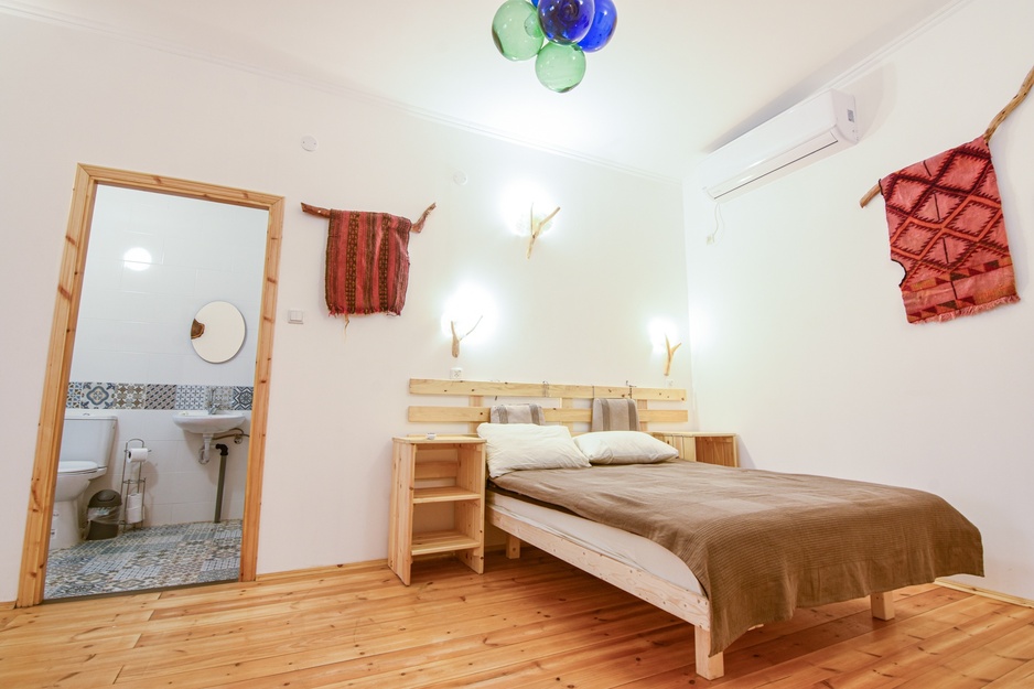Kfar Hanokdim Stone Lodge Bedroom