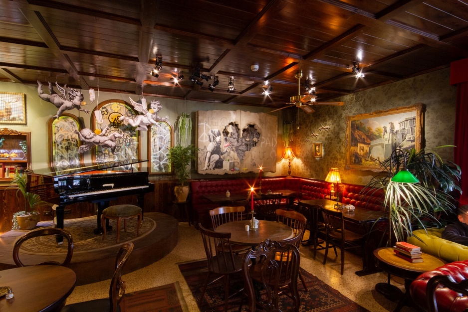 The Walled Off Hotel - Piano Bar Banksy Art on the Walls