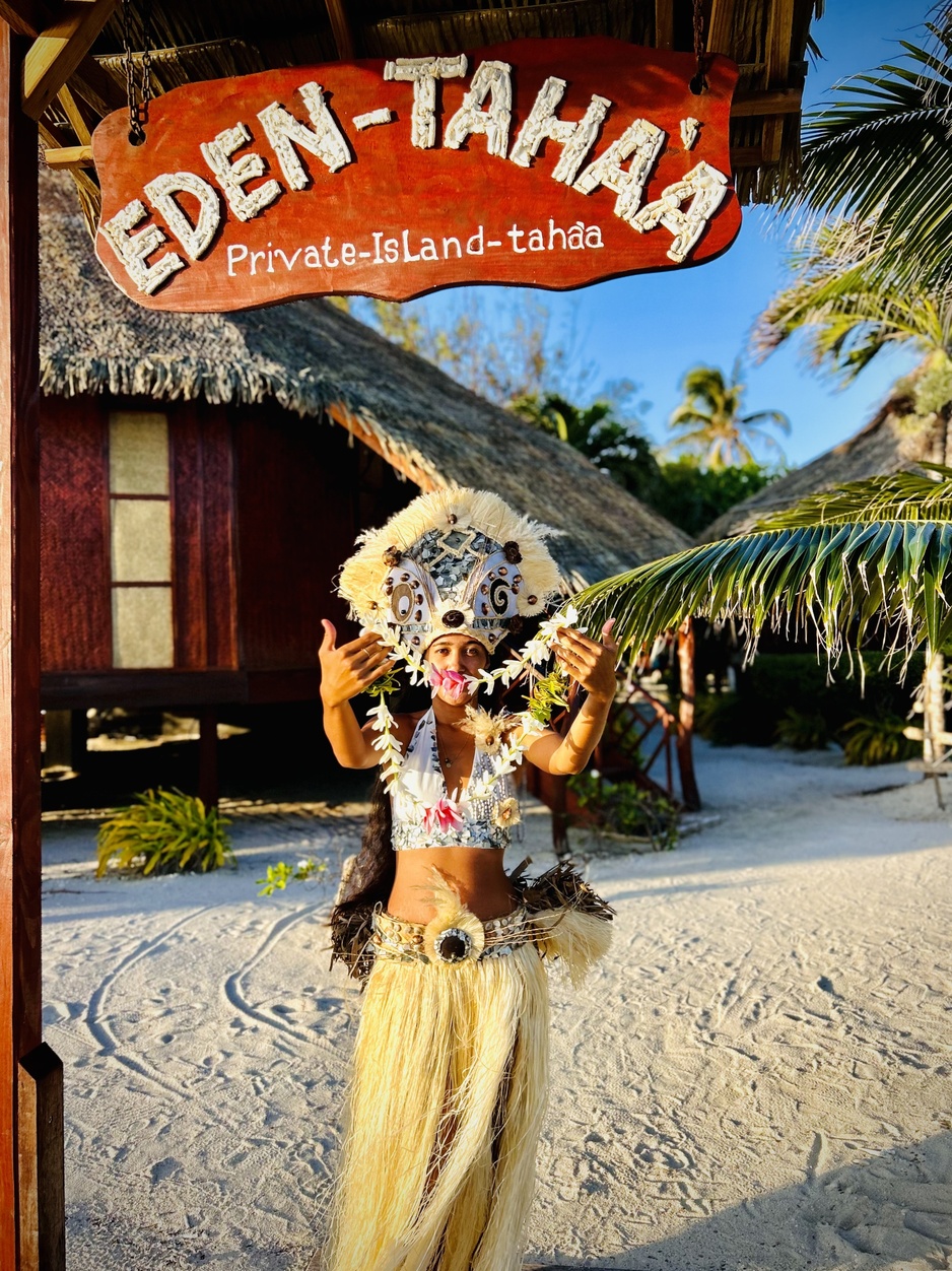 Eden Private Island Taha'a Local Woman Welcoming the Guests