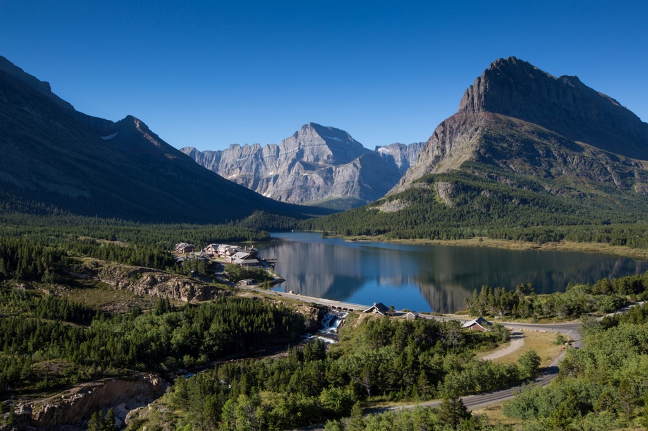 Many Glacier Hotel Surrounded by Tall Mountains