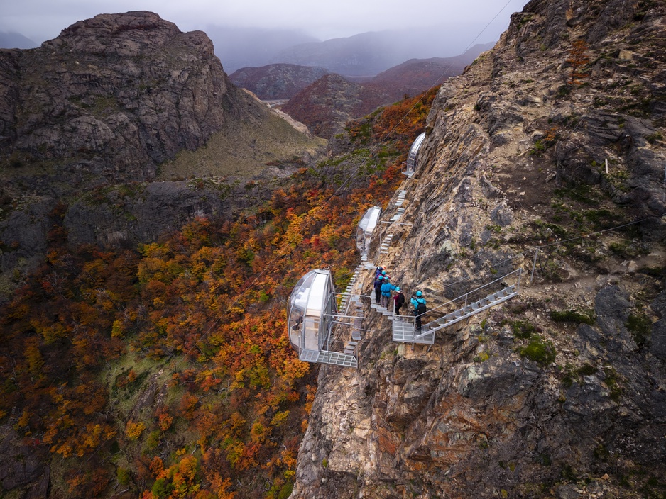 OVO Patagonia Mountain Capsules Hanging from the Cliff