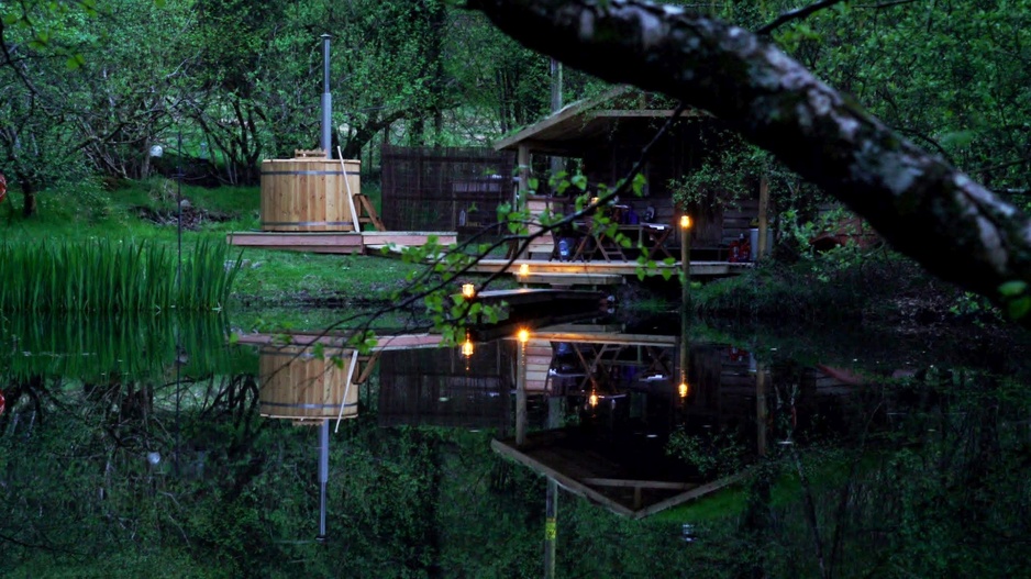 Cabin On The Lake At Night