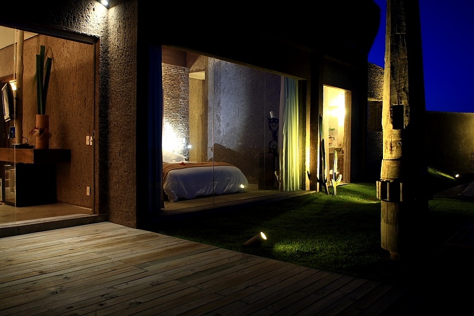 Kenoa Resort bottom to ceiling glass window room