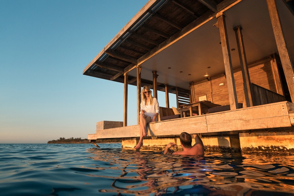 Ngalawa boat and coral reef