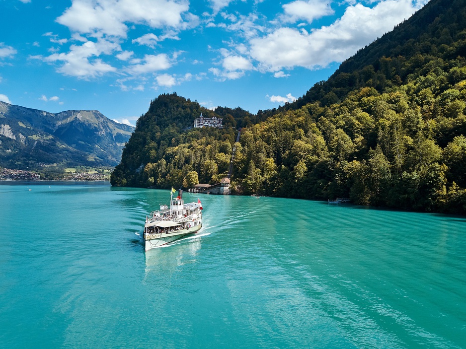 Steamboat on Lake Brienz with Grandhotel Giessbach in the Background