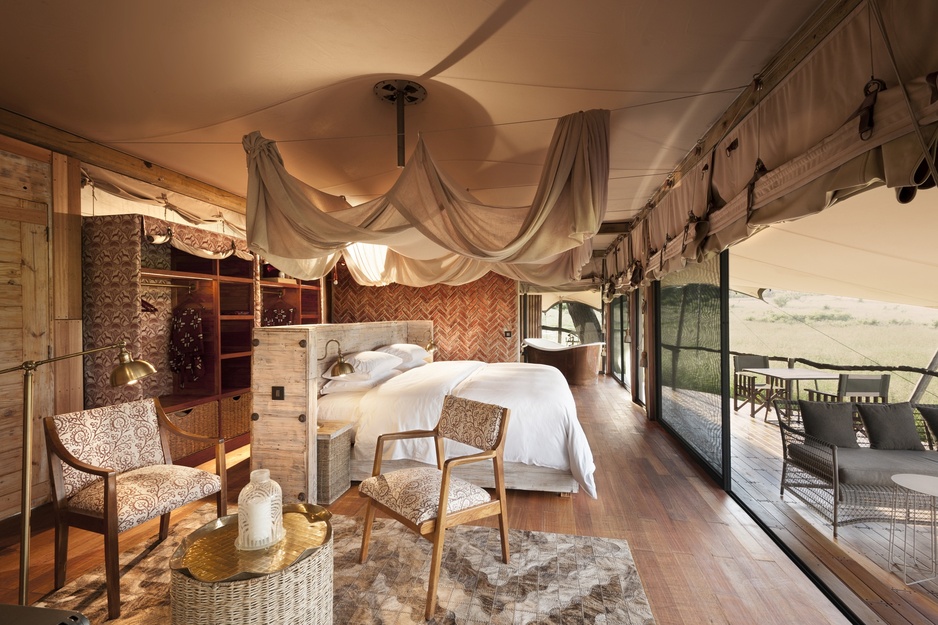 Somalisa Camp Luxury Tented Suite Bedroom with a Private Viewing Deck