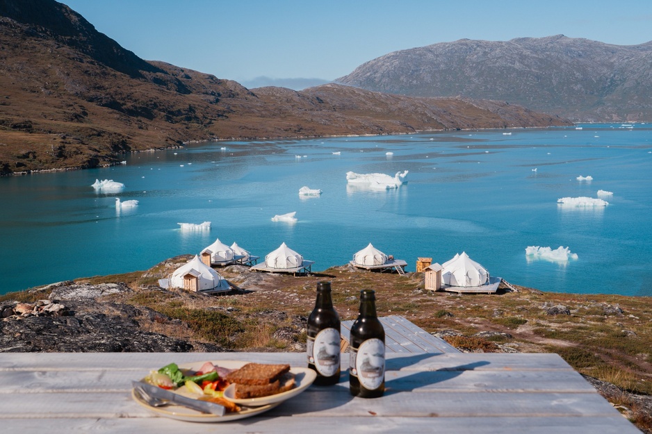 Camp Kangiusaq Outdoor Dining with Iceberg View