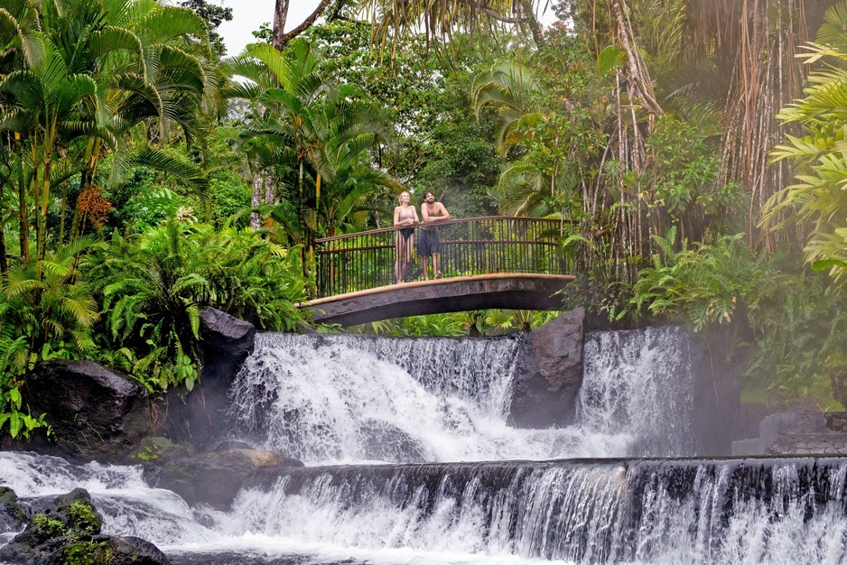 Tabacón Thermal Resort Waterfall and a Bridge