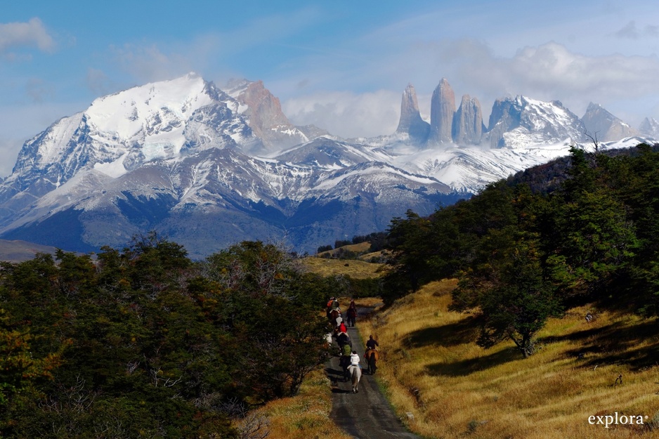 Horse riding in the Torres del Paine National Park, Andes in the background