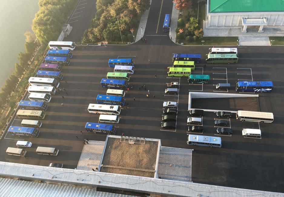 Yanggakdo International Hotel Parking Lot Full of Buses