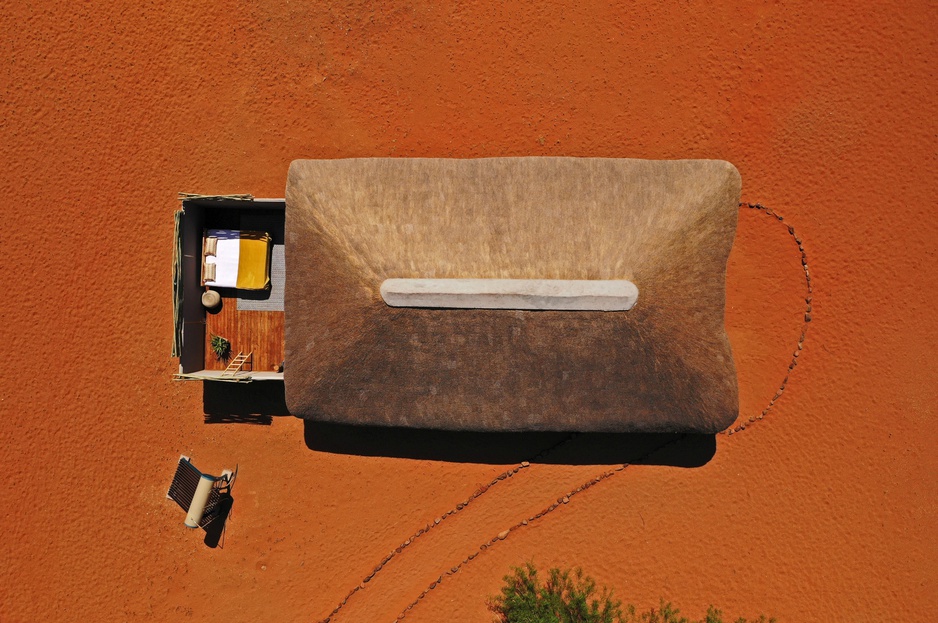 Kwessi Dunes Guest room with additional open stargazing bed