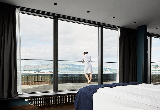 The Exeter Hotel Reykjavik Bedroom Overlooking The Sea And Mountains