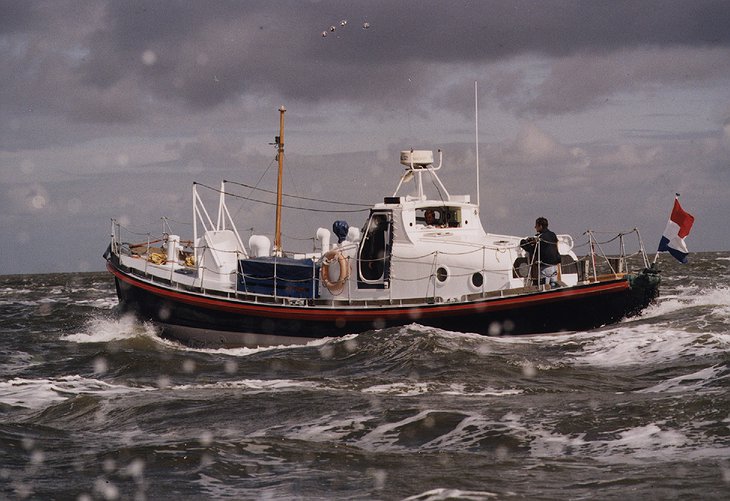 Lifeboat Hotel on the sea in rain