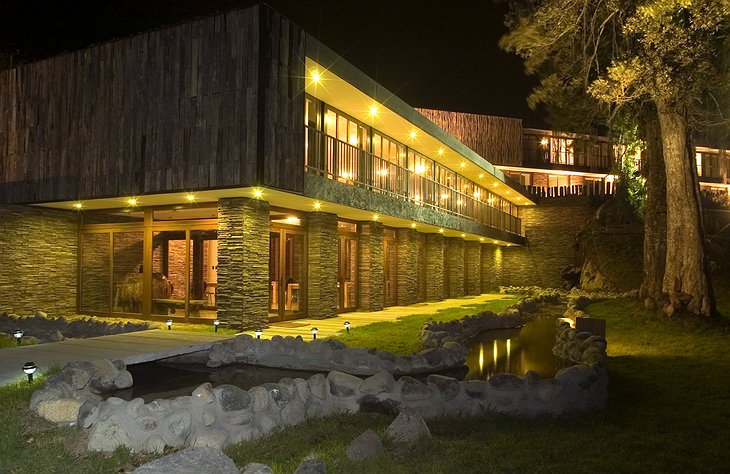 Arrebol Patagonia Hotel exterior at night