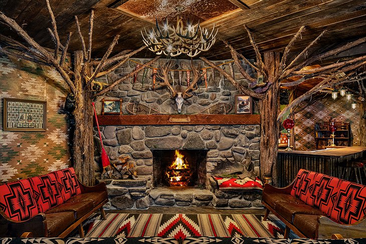 Urban Cowboy Lodge Lounge With Fireplace And Antlers