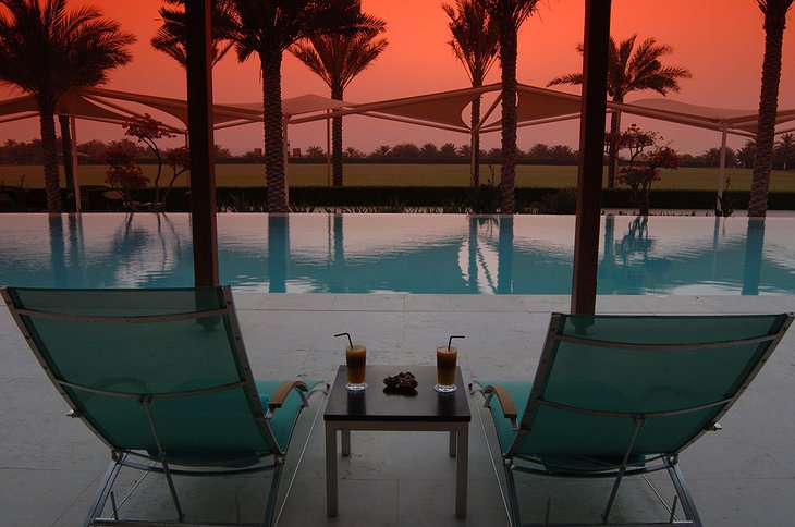 Desert Palm Resort Dubai pool with cocktails