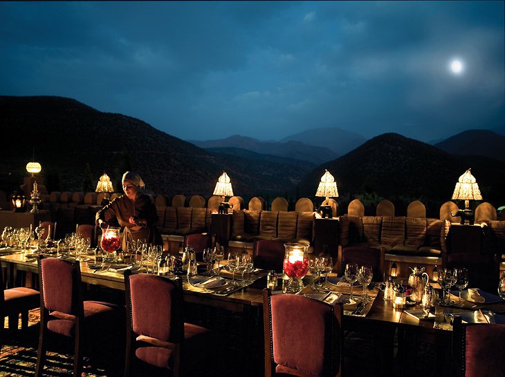 Kasbah Tamadot dining at night on the terrace