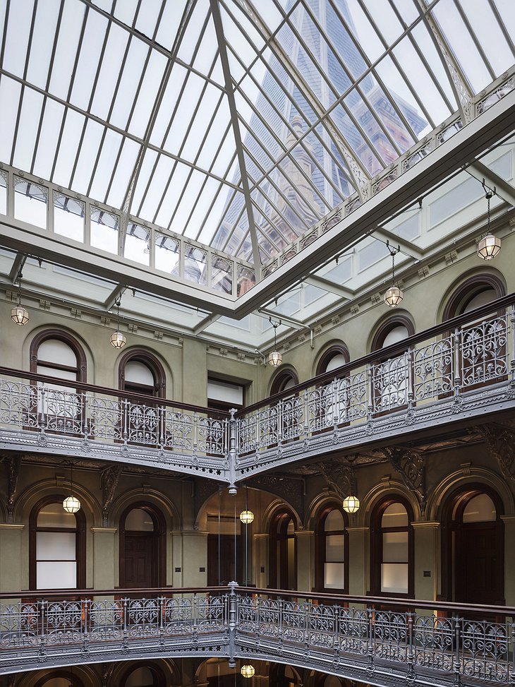 The Beekman Hotel atrium top with view on skyscrapers