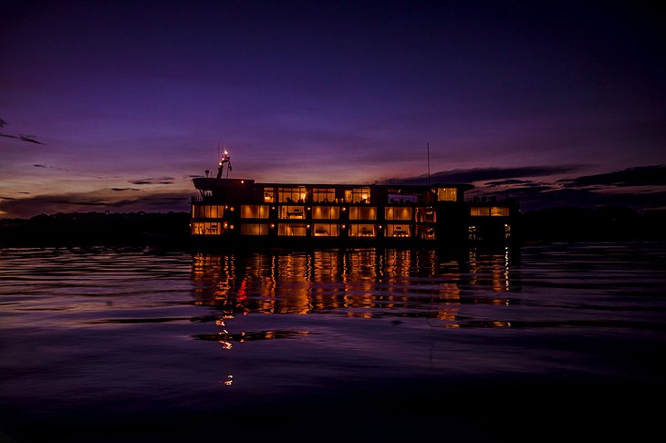 Delfin Amazon Cruises Boat At Night On The Amazon River