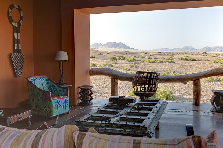 Okahirongo Elephant Lodge living room with nature panorama