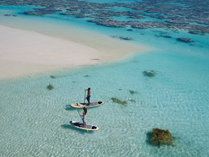Paddle-boarding in the crystal clear ocean