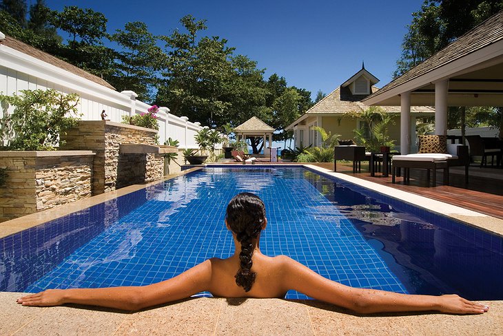 Woman enjoying the villa pool