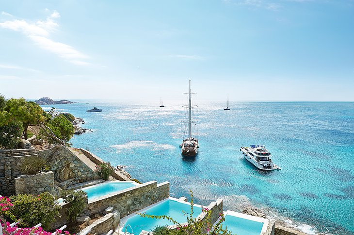 Mykonos Blu resort pools, boats and panoramic views