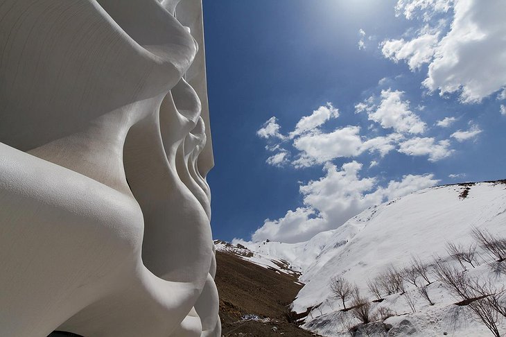 Barin Hotel facade with snowy mountains