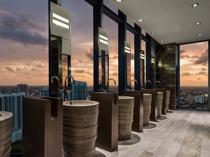 EAST Miami Hotel Public Bathroom With Panorama Through Floor-To-Ceiling Windows