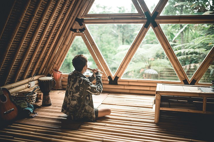 Hideout Bali bamboo house bedroom with triangle windows