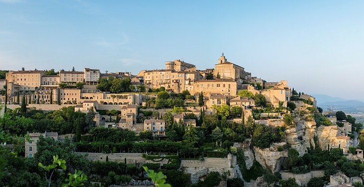 Gordes Village With Stone Walls And Terracotta Roof Tiles