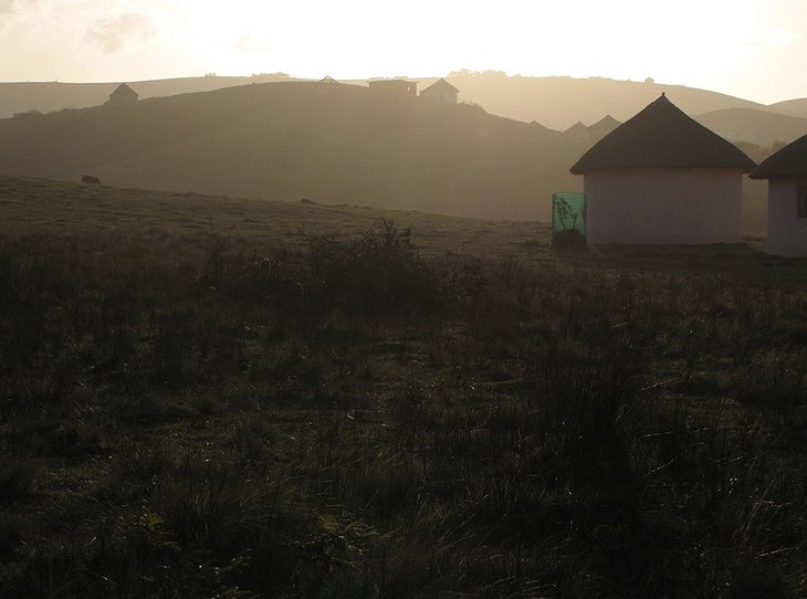 Bulungula Lodge huts on the rolling hills