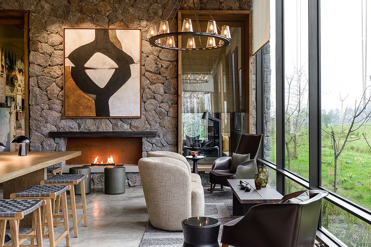 Singita Kwitonda Lodge Lounge With Fireplace