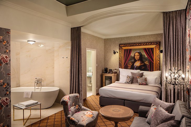 Mystery Hotel Budapest Studio Suite Bed With Mona Lisa Art