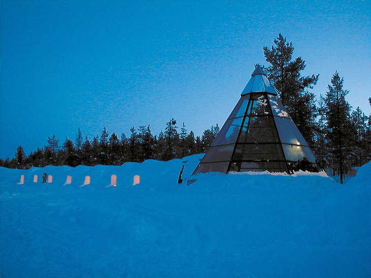 Glass igloo with snow