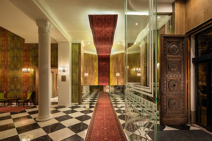 Mystery Hotel Budapest Reception With "Flying" Carpet On The Ceiling