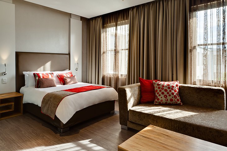 Protea Breakwater Lodge business suite bedroom