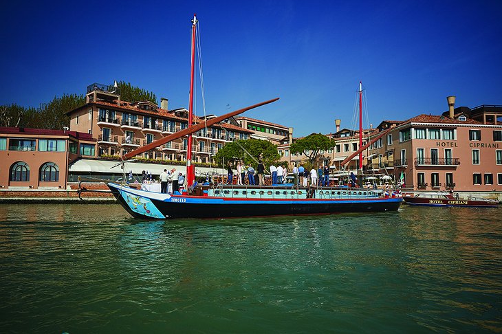 Belmond Hotel Cipriani dock with vintage boat
