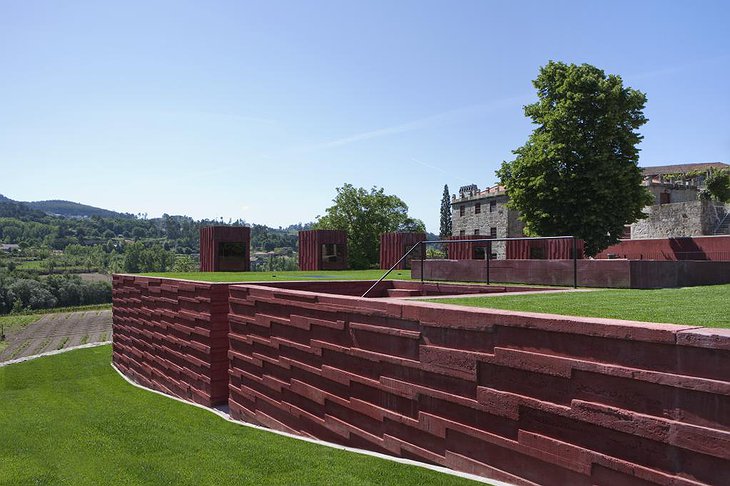 Paco de Pombeiro modern building and castle in the background