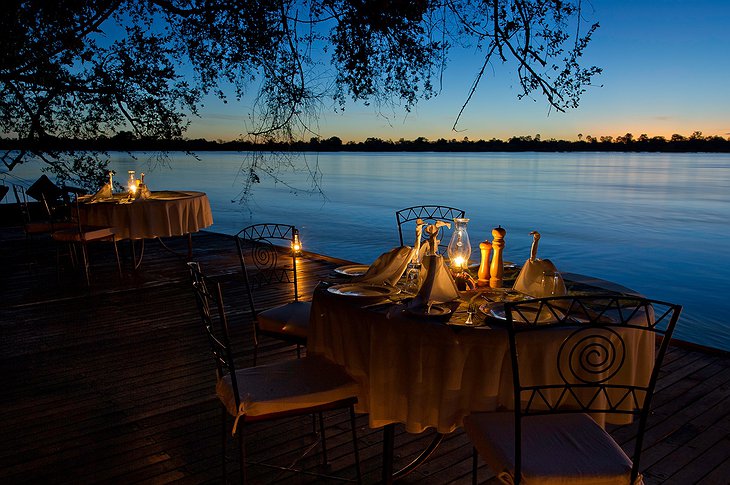 Tongabezi Lodge romantic riverside dining in the evening