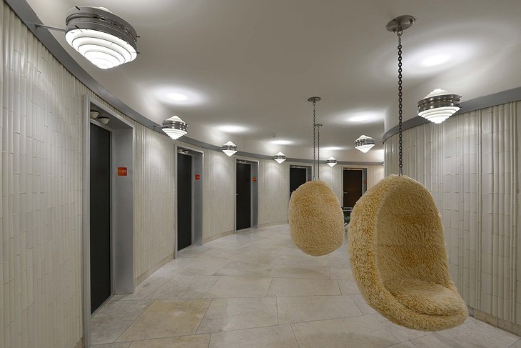 Hotel Ještěd hall with design swing chairs