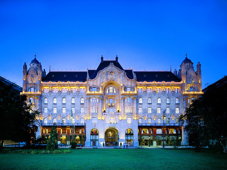 Four Seasons Hotel Gresham Palace at night with the lights on