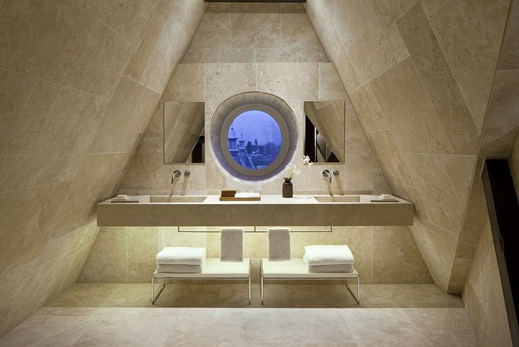 Conservatorium Hotel attic bathroom with rounded window