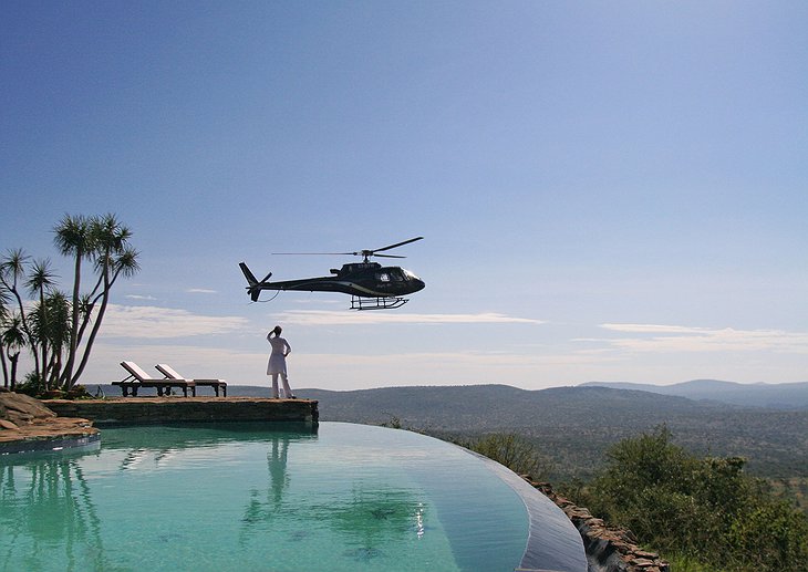 Loisaba house swimming pool with helicopter