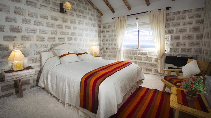 Hotel de Sal Luna Salada bedroom with salt lake views