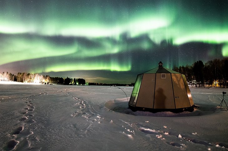 Northern lights at lake Ranua during winter