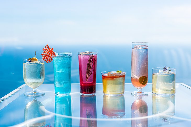 Wild, Colorful Cocktails With The Mediterranean Sea In The Background