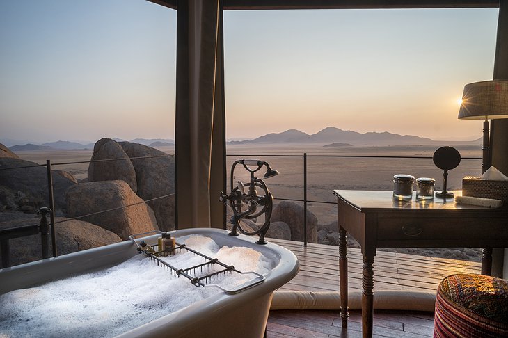 Zannier Hotels Sonop Open-Air Bathroom With Vintage Freestanding Bathtub Overlooking The Landscape Of Namibia