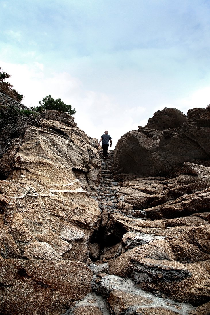 San Giorgio Mykonos rock cliff path
