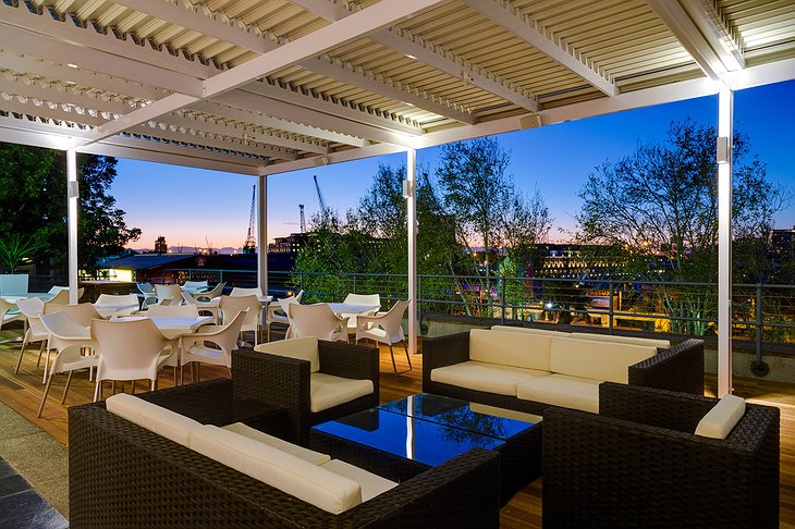 Protea Breakwater Lodge rooftop terrace at night